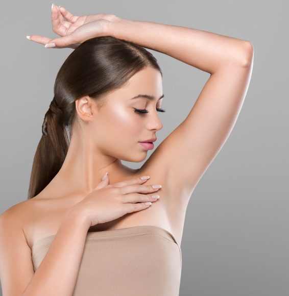 Armpit woman healthy skin depilation concept woman hand up. Colo Armpit woman healthy skin depilation concept woman hand up. Color bakcground. Studio shot.